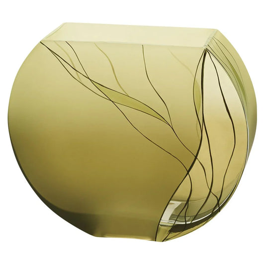 Modern round amber glass vase with curved lines on a white background