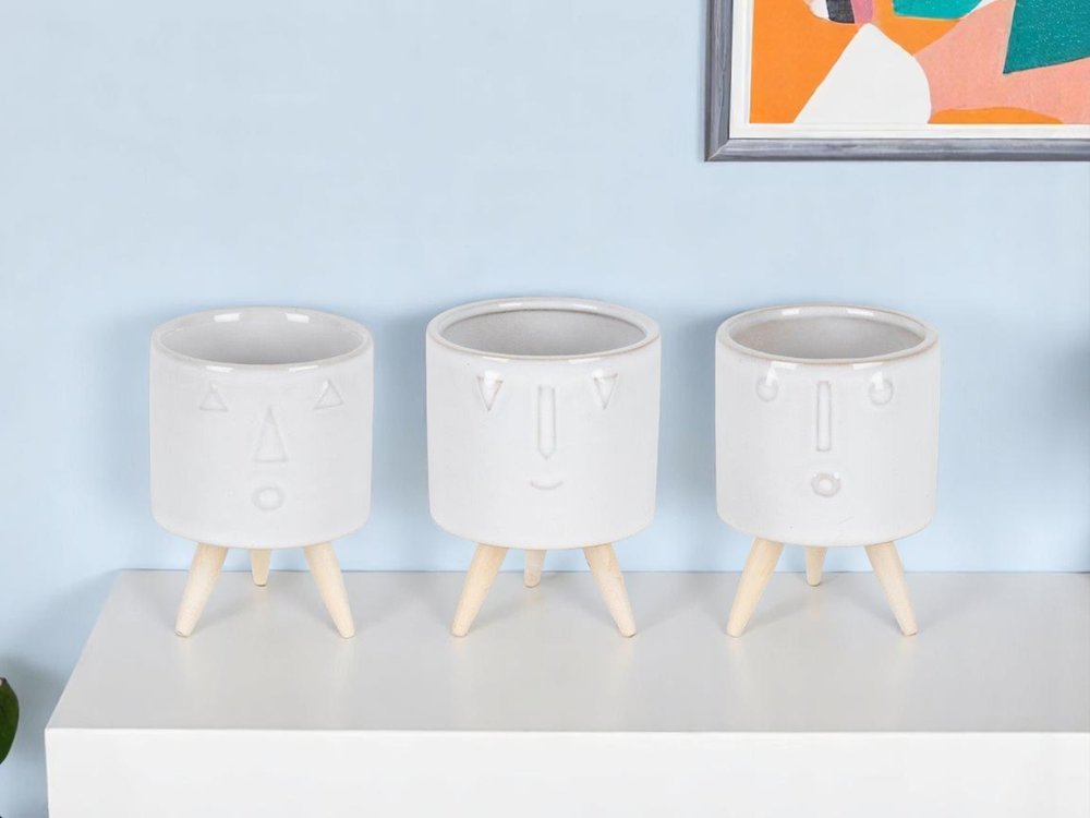 Set of Three White Porcelain 1 Ounce Round Funny Face Pot Planters With Stands HomeRoots