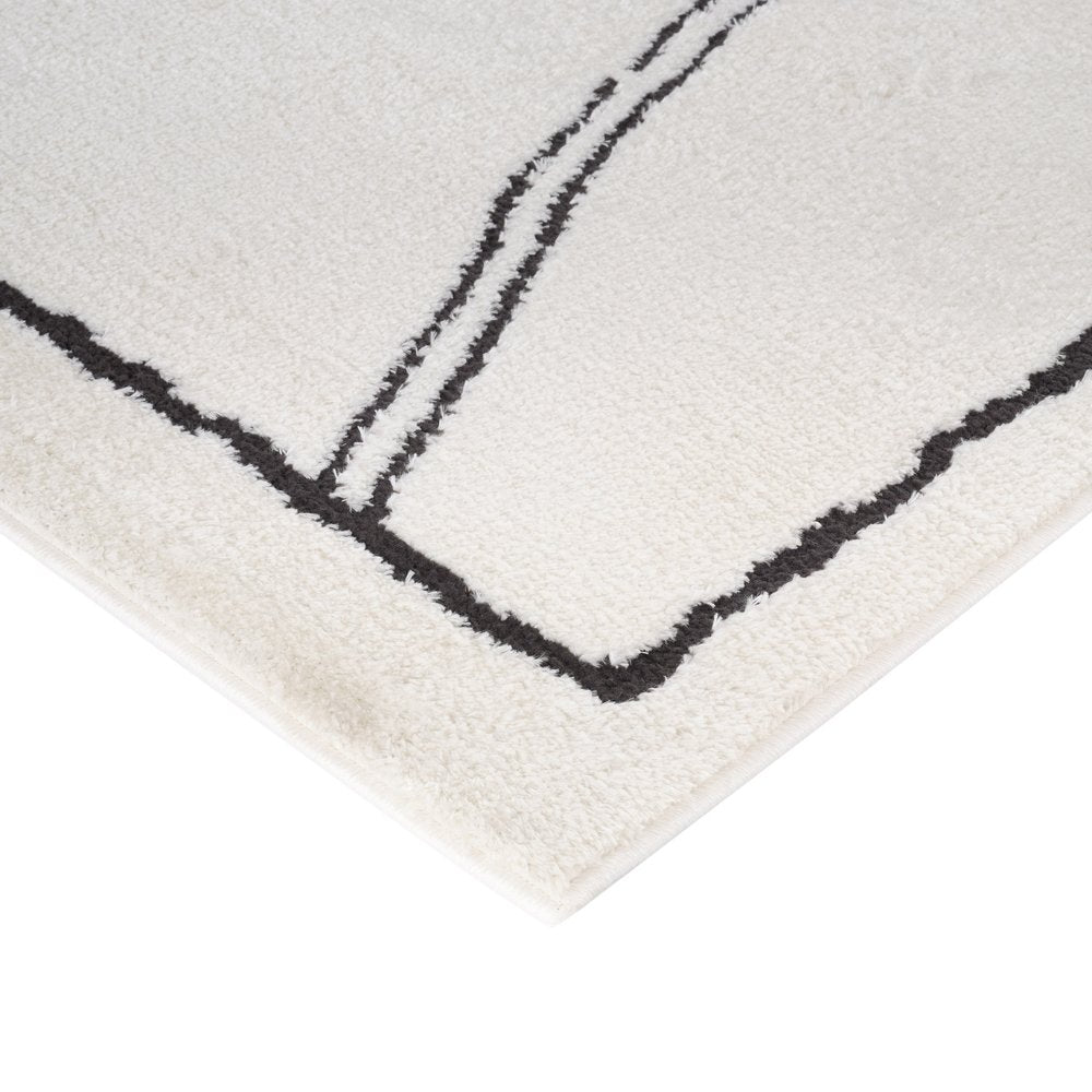 Ivory & Black Geometric Area Rug - 5' x 7' Stain Resistant Polypropylene - Fluent Trends