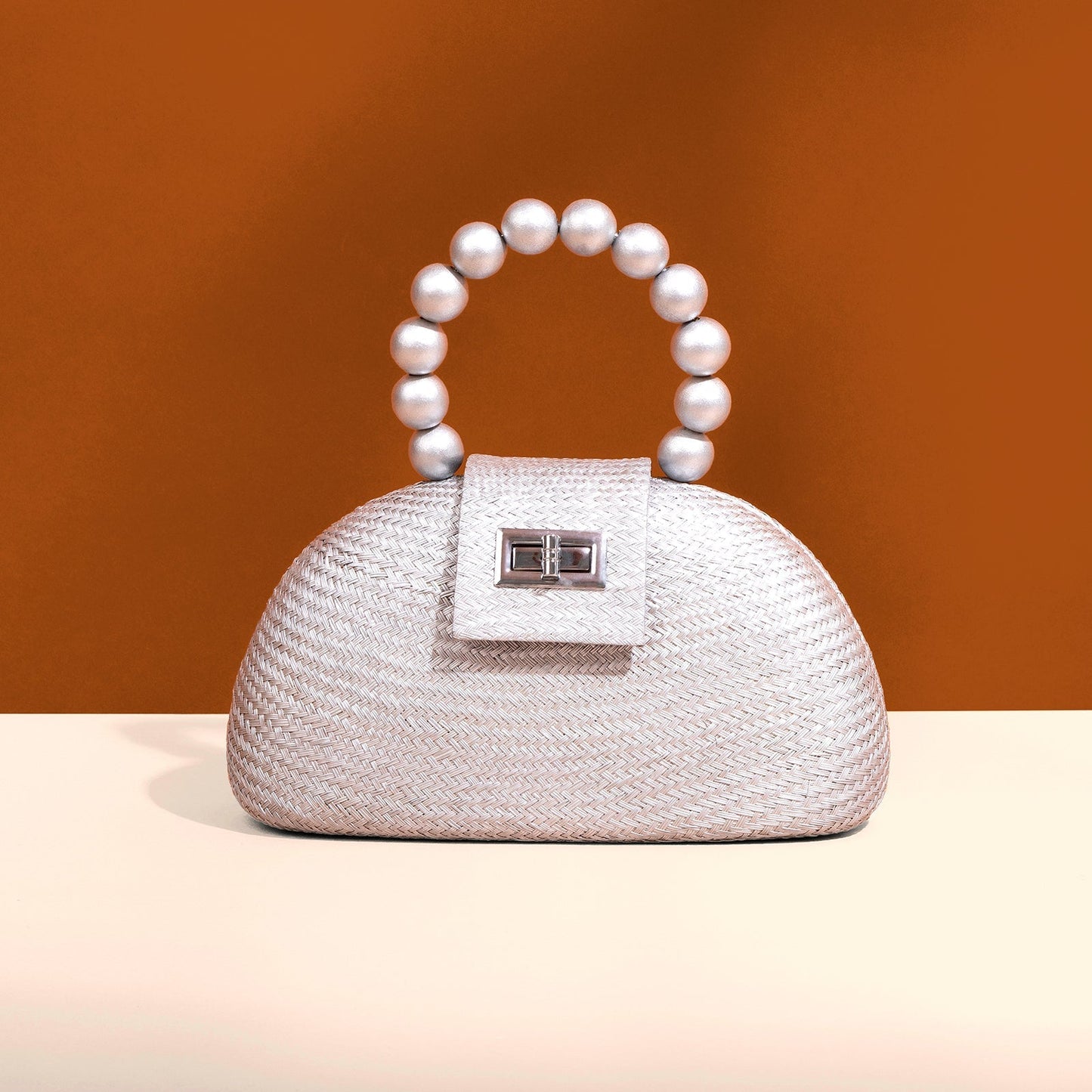 The Orla Silver Woven Straw & Wooden Bead Statement Clutch Bag - Fluent Trends