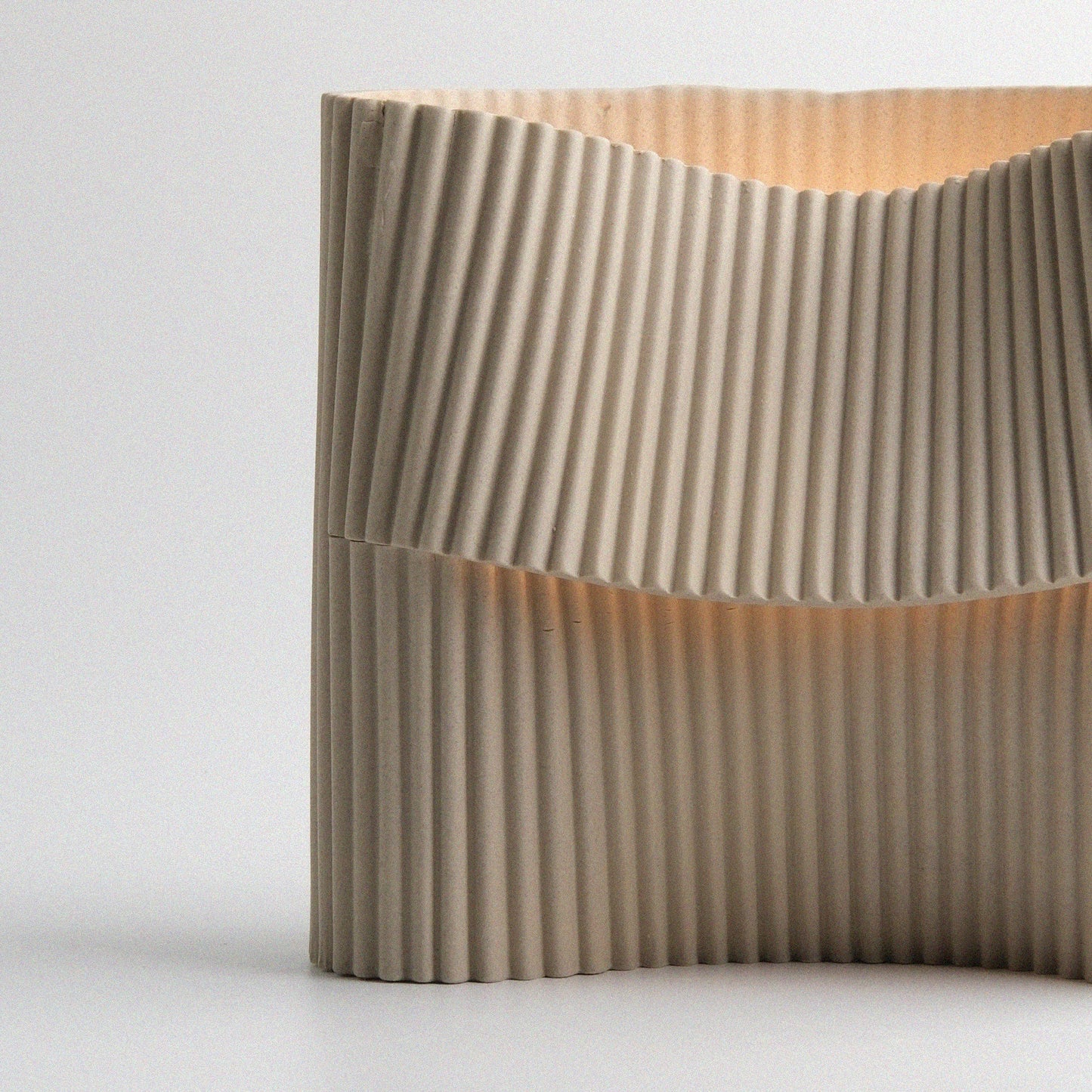 lose-up of ribbed stoneware texture on the Corduroy handcrafted table lamp