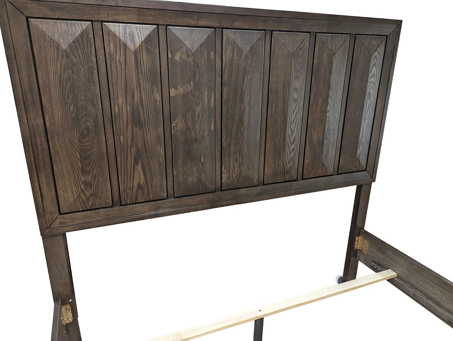 Internal structure of an espresso King bedframe showing a support slat, metal hardware, and faceted wood panel framework.