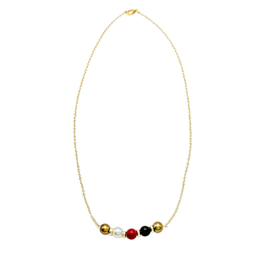 His-Story Majorca pearl bar necklace with five gold, white, red, black, and gold pearls on a gold-plated chain, shown on a white background.