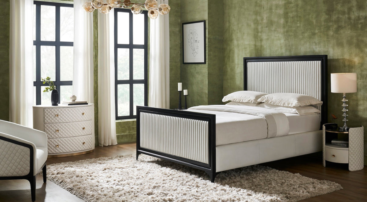Quilted Round Leather Nightstand white bedroom lifestyle beside bed green wall chandelier shag rug styled