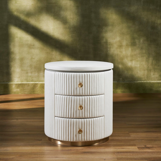 Stanford Round Fluted Leather Nightstand white three drawers brass knobs brass rim base front view full body warm green background