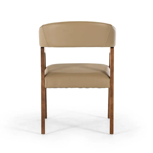 Taupe faux leather curved dining chair with brown solid wood legs and bentwood backrest seen from a clean back studio view