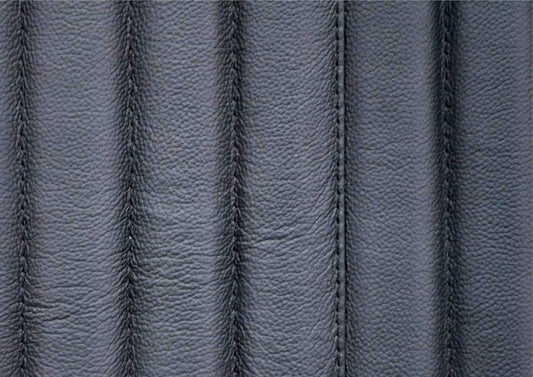 Top-grain leather lounge chair black genuine leather close texture natural grain detail