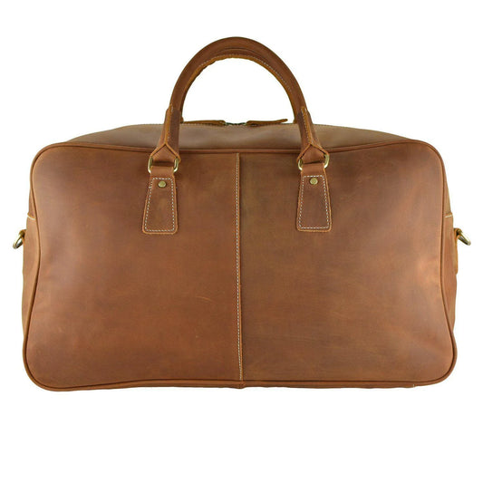 WANDERLUST Roadster leather travel bag British Tan front view showing structured cowhide body dual top handles and gold tone zipper hardware