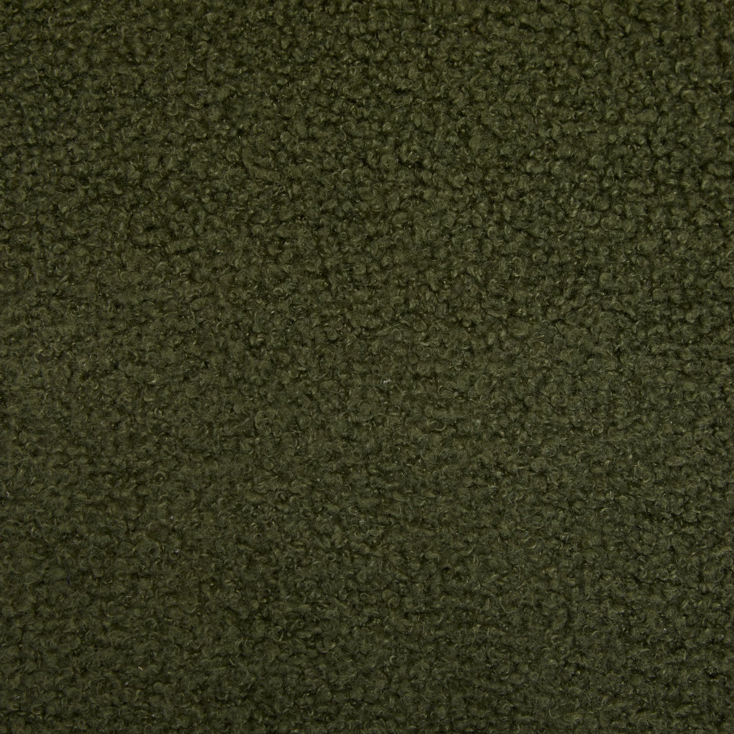 Close-up of dark green boucle fabric texture with soft, looped fibers for upholstery and fashion