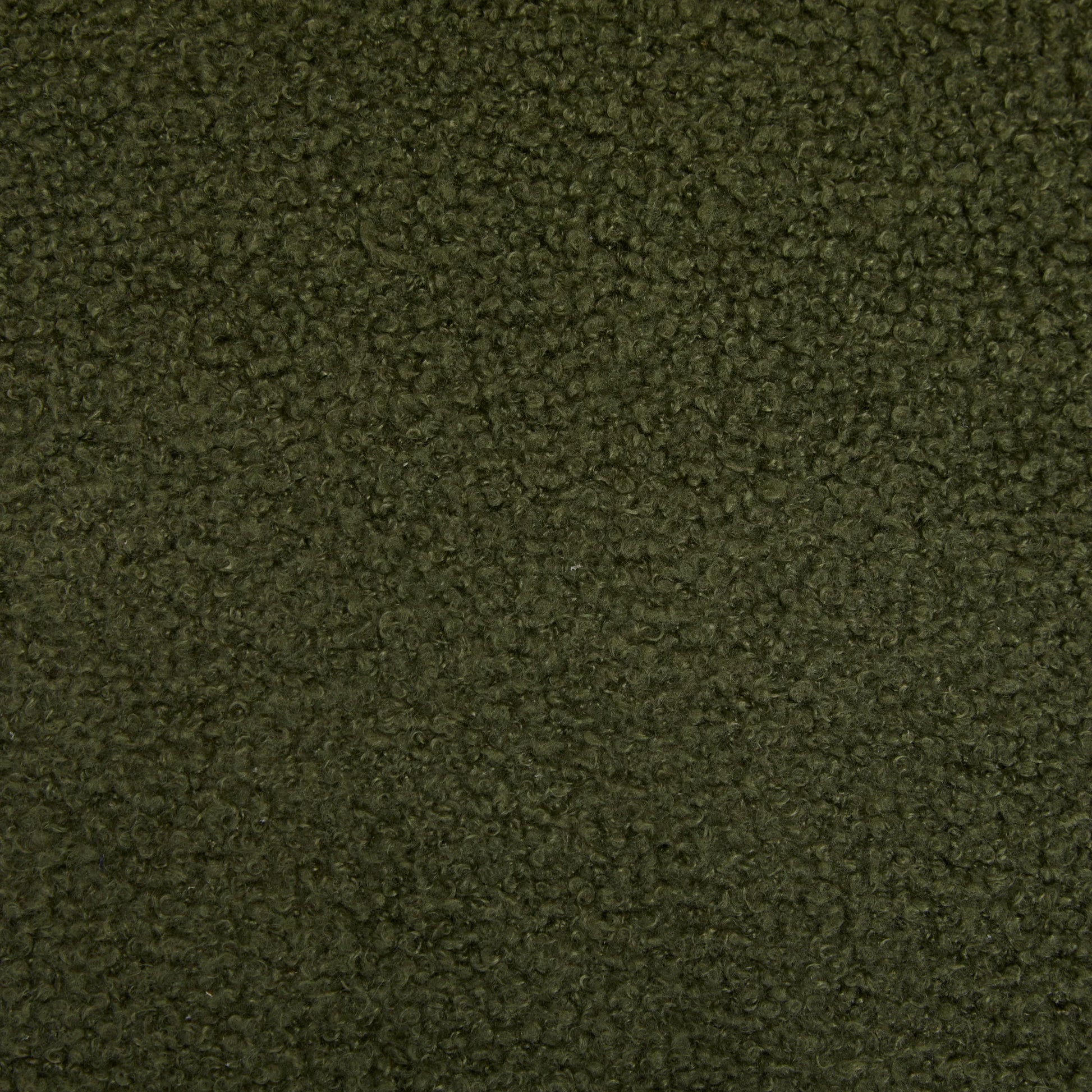 Close-up of dark green boucle fabric texture with soft, looped fibers for upholstery and fashion