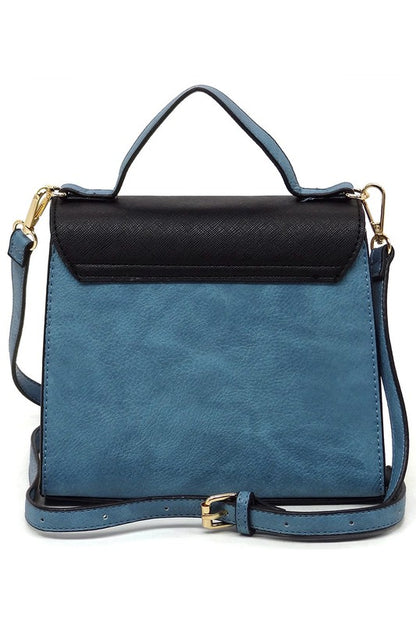 Blue and black leather handbag with top handle and adjustable shoulder strap, gold hardware