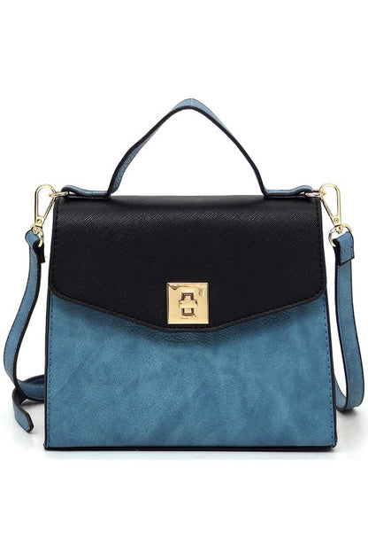 Two-tone blue and black leather handbag with gold clasp and detachable shoulder strap