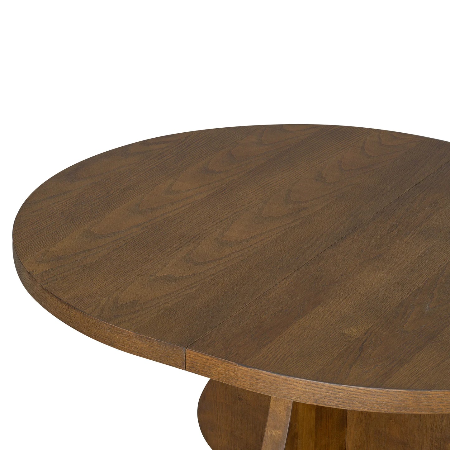 Close-up of round wooden table with natural grain texture and warm brown finish