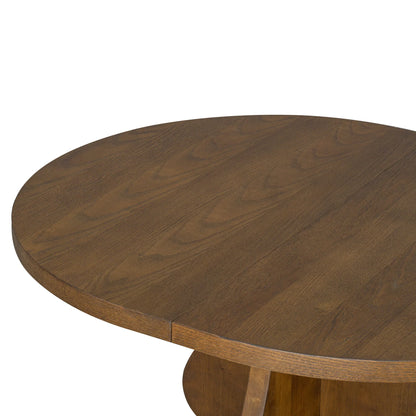 Close-up of round wooden table with natural grain texture and warm brown finish