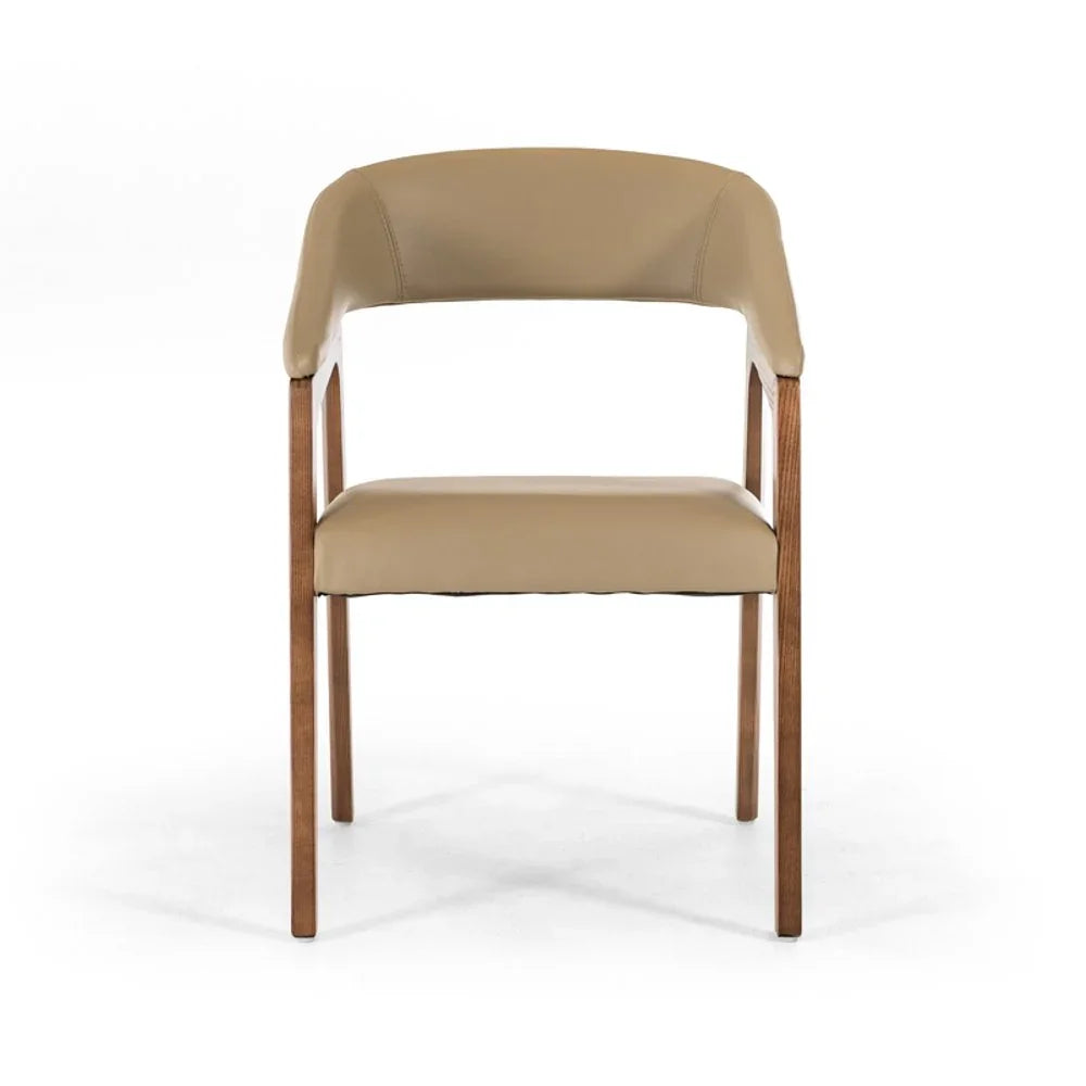 Modern beige leather dining chair with curved backrest and wooden legs on white background