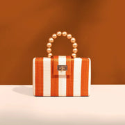 The Louisa Orange & Cream Stripe Woven Straw Clutch Bag - Fluent Trends