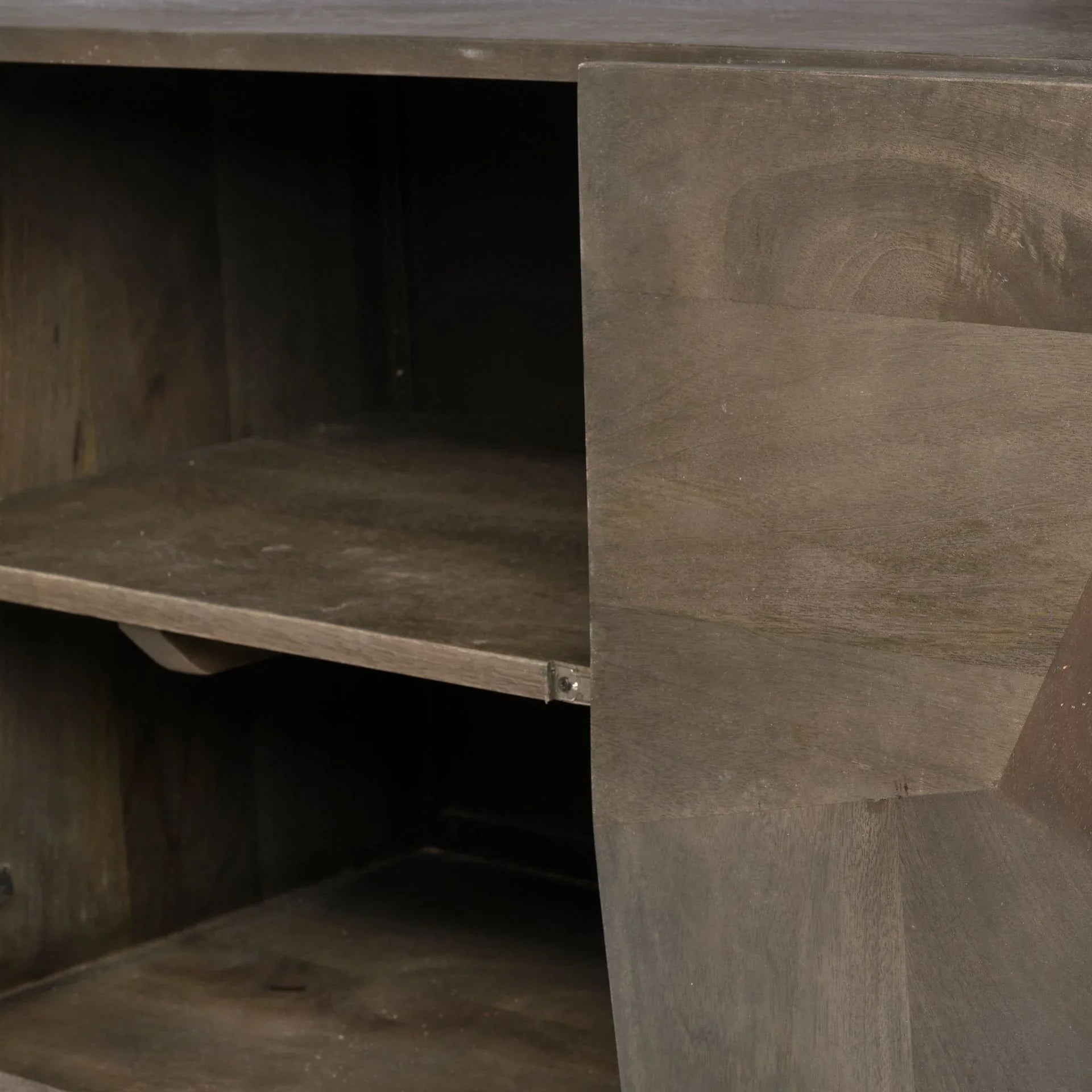 Close-up view of the storage interior showing the solid wood shelves.