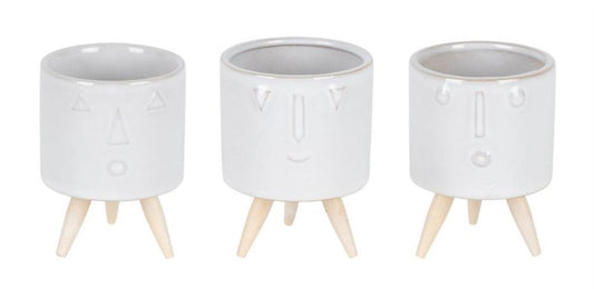 Set of Three White Porcelain 1 Ounce Round Funny Face Pot Planters With Stands HomeRoots