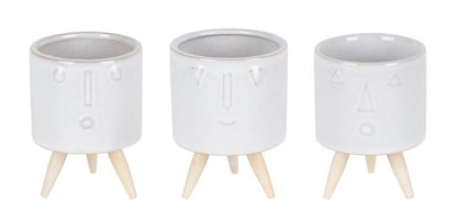 Set of Three White Porcelain 1 Ounce Round Funny Face Pot Planters With Stands HomeRoots