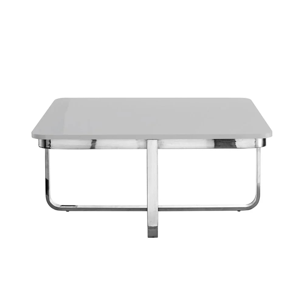 Modern square coffee table with glossy white top and chrome metal legs, minimalist design