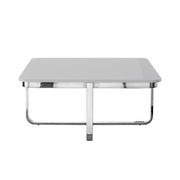 Modern rectangular coffee table with white top and chrome metal legs