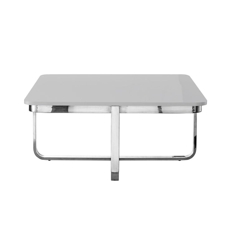 Modern rectangular coffee table with white top and chrome metal legs