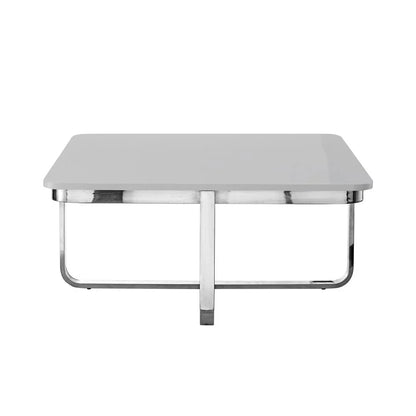 Modern square coffee table with glossy white top and chrome metal legs, minimalist design