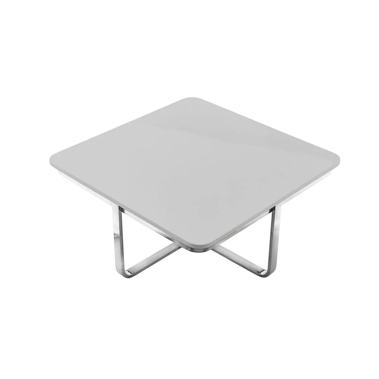 Modern square white coffee table with chrome metal legs on white background
