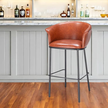 Kace Cognac Faux Leather Bar Stool with Black Steel Legs in modern kitchen