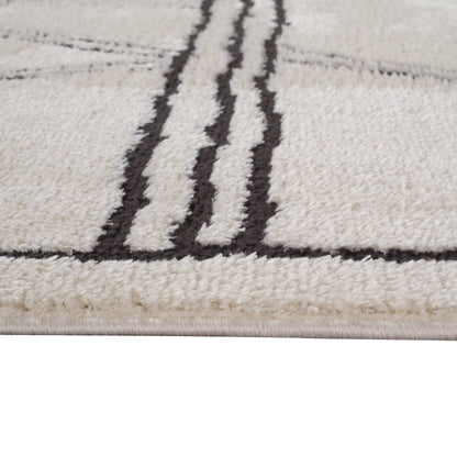 Ivory & Black Geometric Area Rug - 5' x 7' Stain Resistant Polypropylene