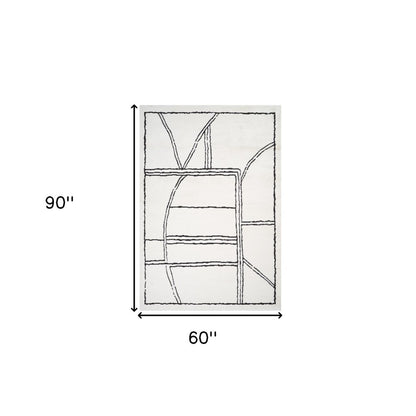 Ivory & Black Geometric Area Rug - 5' x 7' Stain Resistant Polypropylene