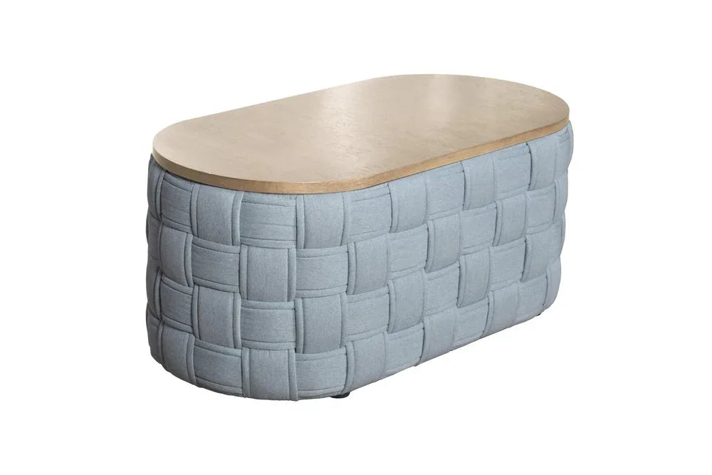 A left-side profile of the Kinsley oval woven ottoman table, showcasing the thick natural braided rope texture and the smooth, light wood top surface against a solid neutral background.