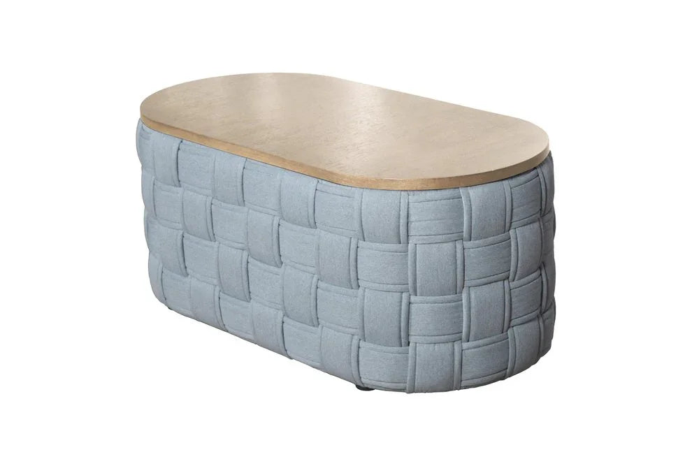 A right-side profile of the Kinsley oval woven ottoman table.