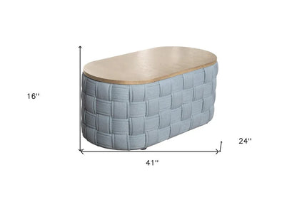 An oval dimension diagram for the Kinsley woven ottoman table, indicating a total width of 41 inches, a total depth of 24 inches, and a height of 16 inches.