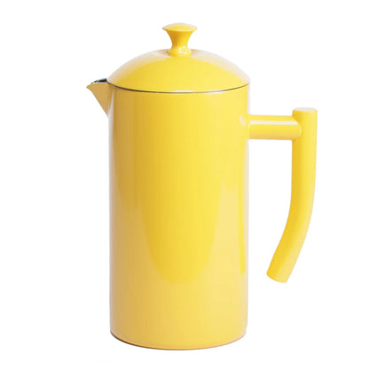 Yellow ceramic French press coffee maker with lid and handle on white background