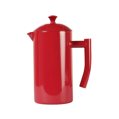 Red metal French press coffee maker with lid and handle on white background