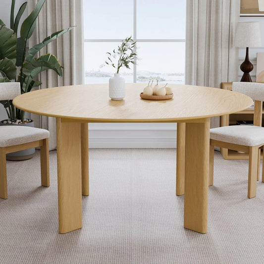 Modern light wood round dining table with chairs in a stylish living room, Fluent Trends furniture