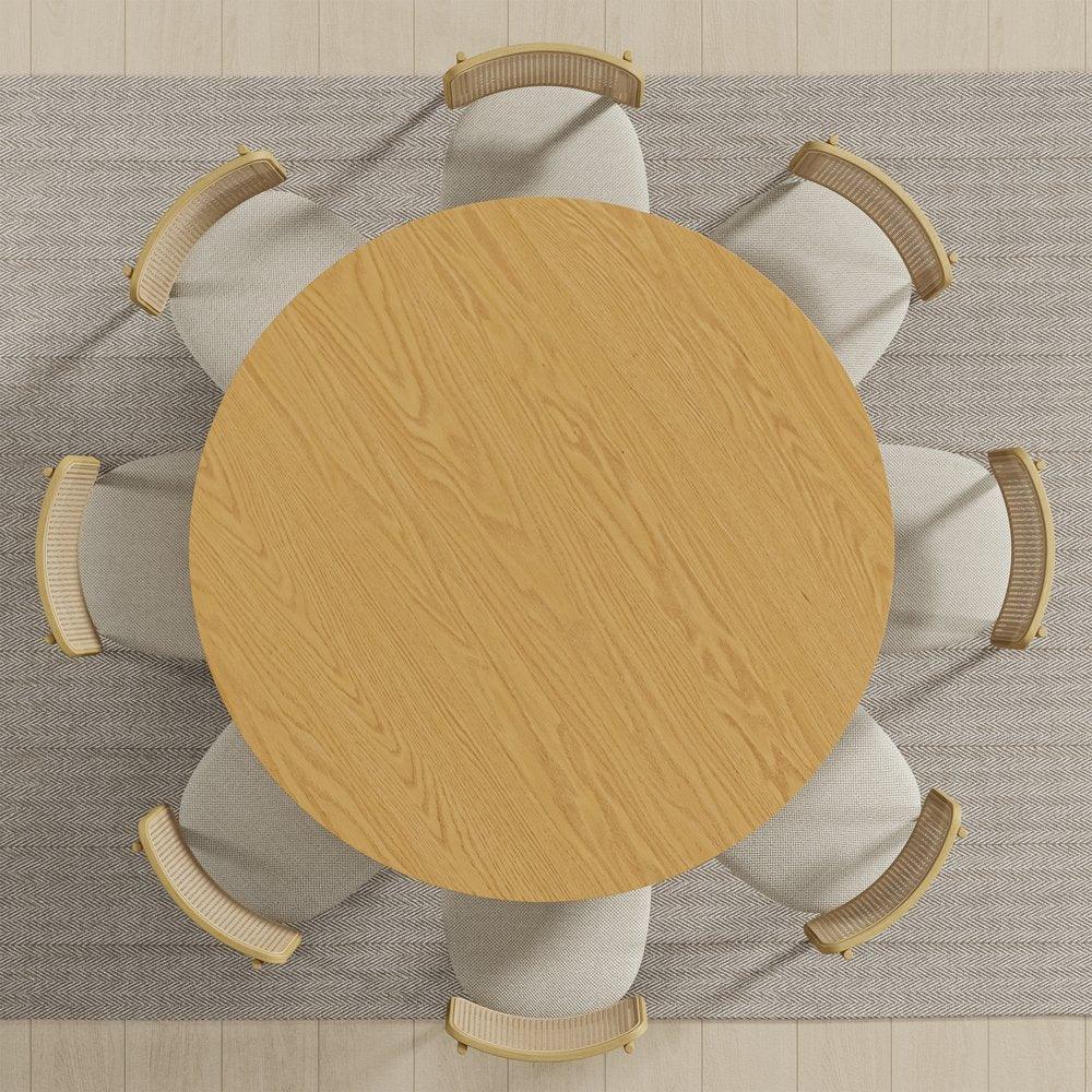 Round wooden dining table with six beige chairs on textured rug, Fluent Trends home furniture