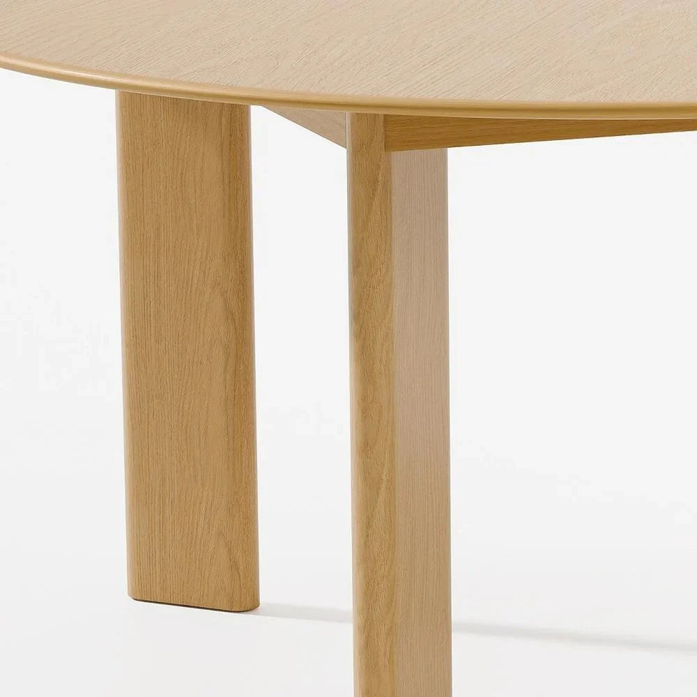 Minimalist round wooden table with natural finish, modern home furniture from Fluent Trends.