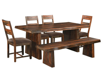 Handmade premium quality solid wood dining set with a seventy-four inch table four ladder back chairs and matching bench isolated on a white background