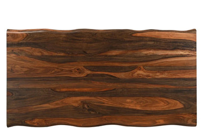 Top down view showcasing the rich dark brown grain patterns and wavy live edge of a handmade premium quality solid wood dining table top isolated on a white background