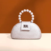 The Orla Silver Woven Straw & Wooden Bead Statement Clutch Bag - Fluent Trends