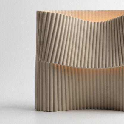 lose-up of ribbed stoneware texture on the Corduroy handcrafted table lamp