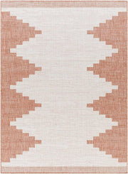 Hauteloom Djugun Peach Fuzz indoor/outdoor rug with Aztec geometric pattern in peach and white, no-pile design