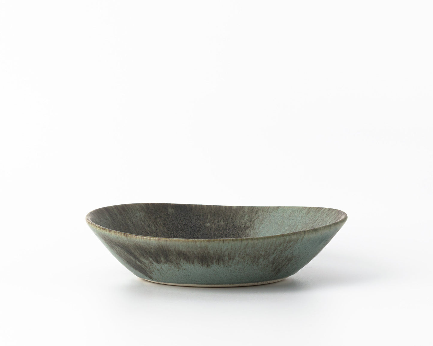 Haand Large Ripple pasta bowl in concrete finish with textured green and gray glaze