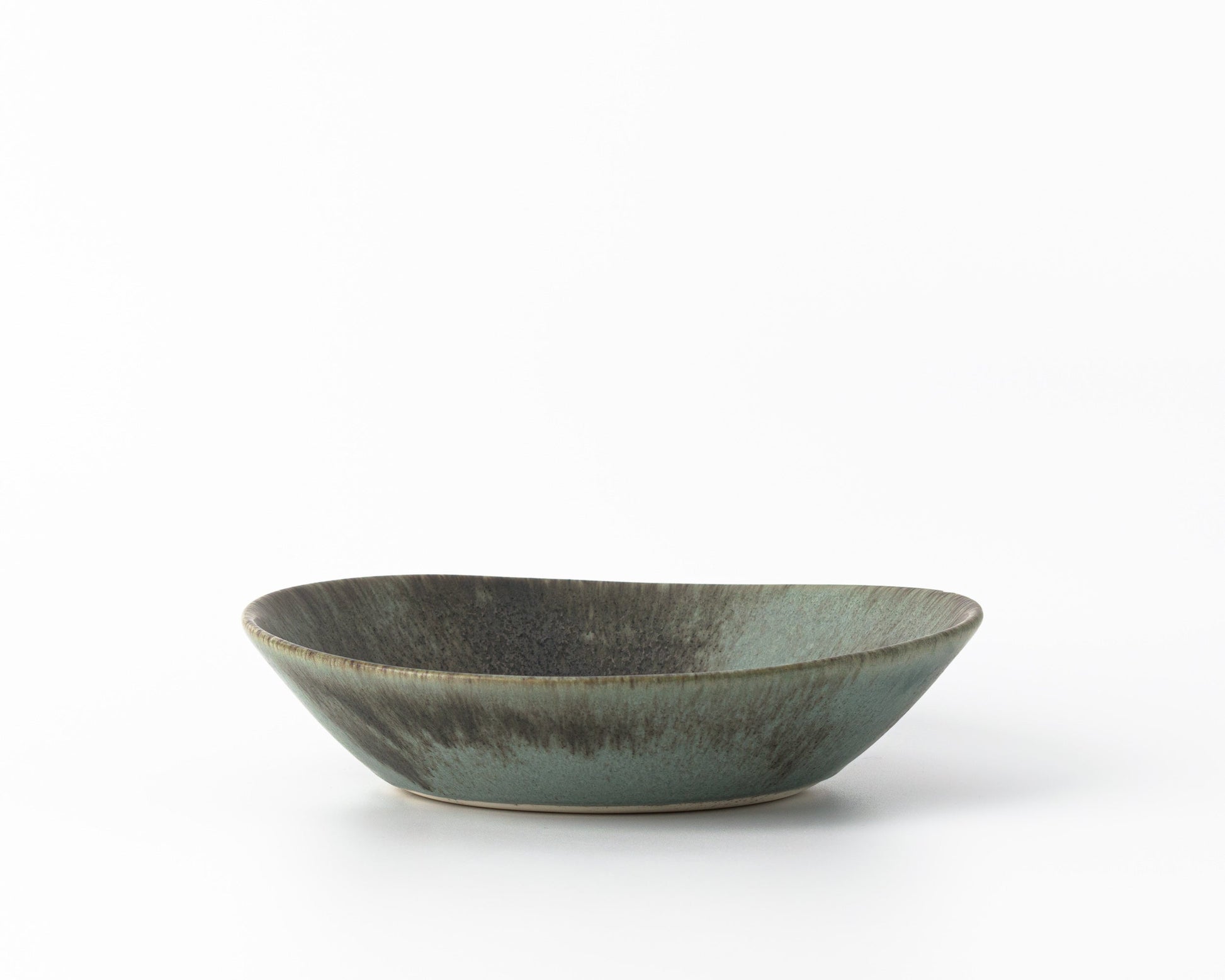 Haand Large Ripple pasta bowl in concrete finish with textured green and gray glaze