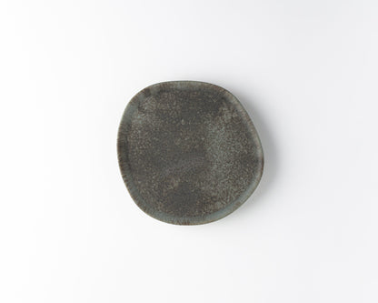 Handcrafted ceramic Ripple Salad plate with textured dark gray glaze on white background