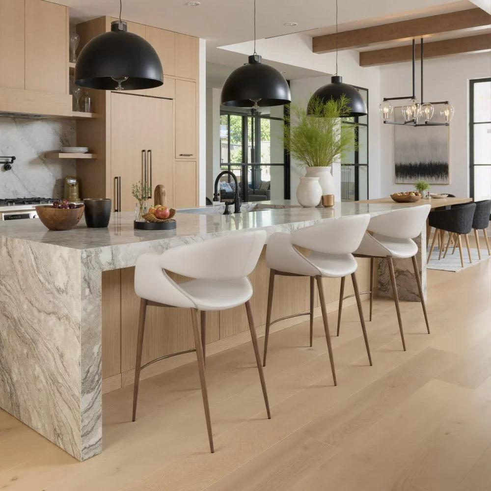Modern White Vinyl Bar Chair in Contemporary Marble Kitchen Setting
