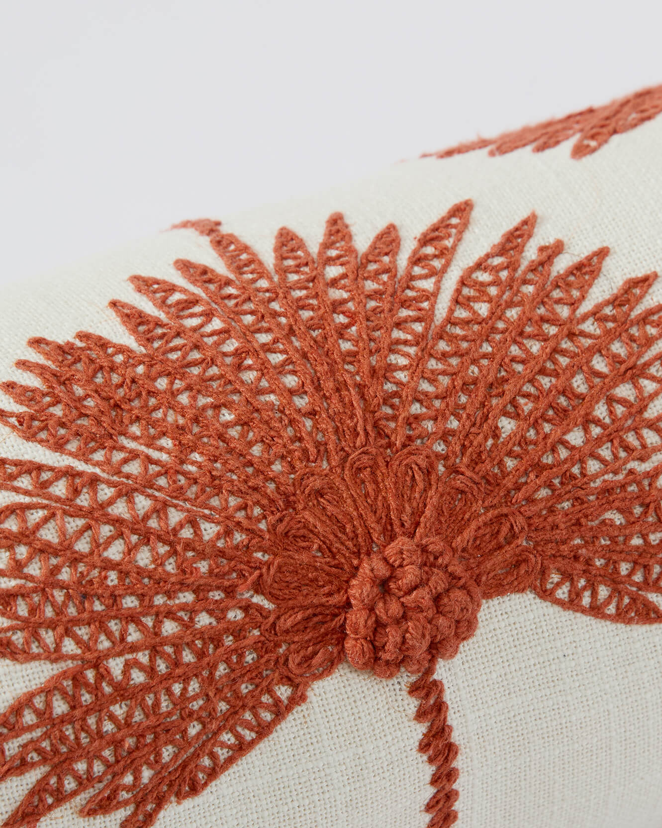 Sunday Citizen Palm Leaf Embroidered Bolster Pillow Sienna Off White close detail embroidery 