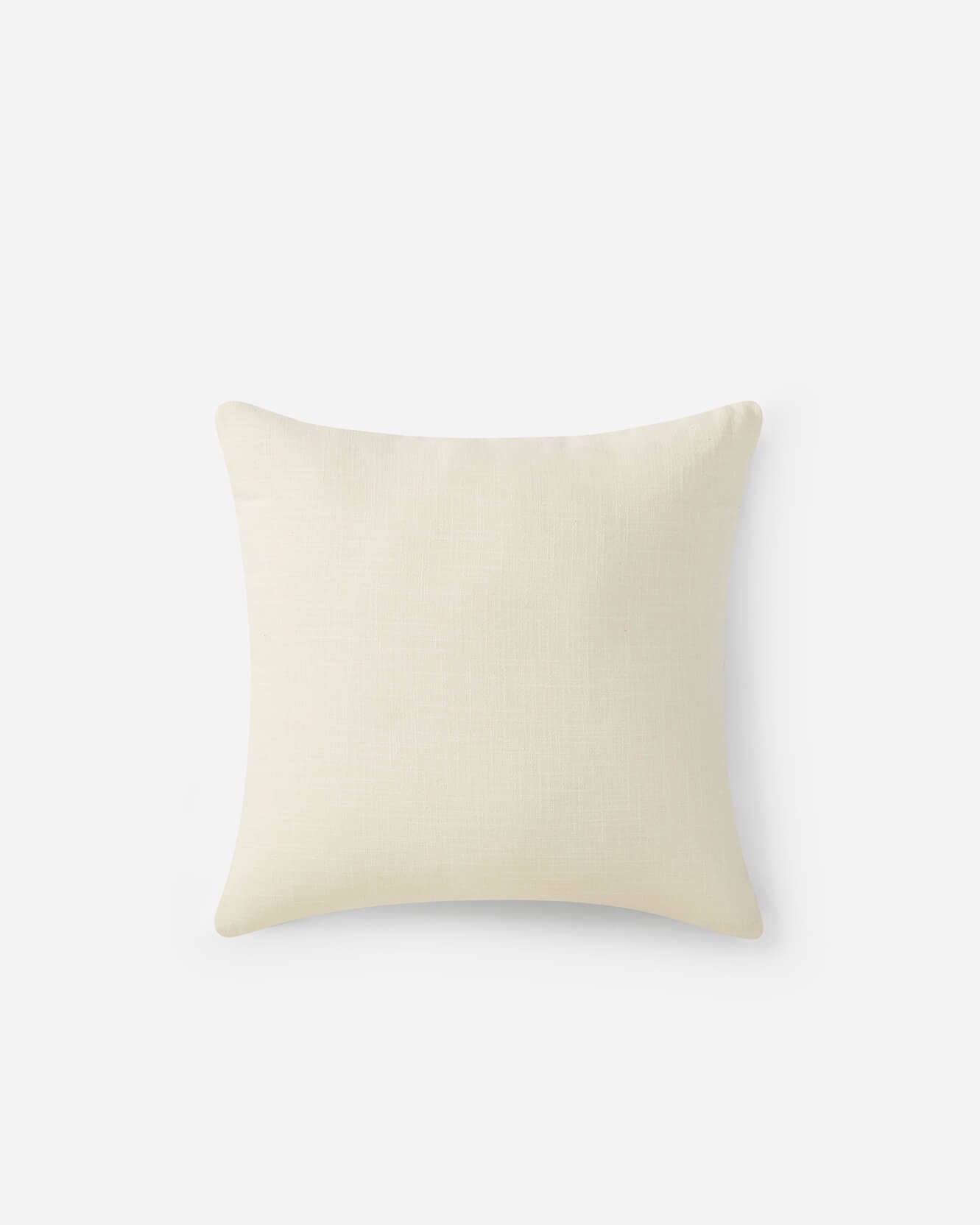 Reverse side of palm leaf embroidered throw pillow sienna off white variant showing plain off white linen back on grey background